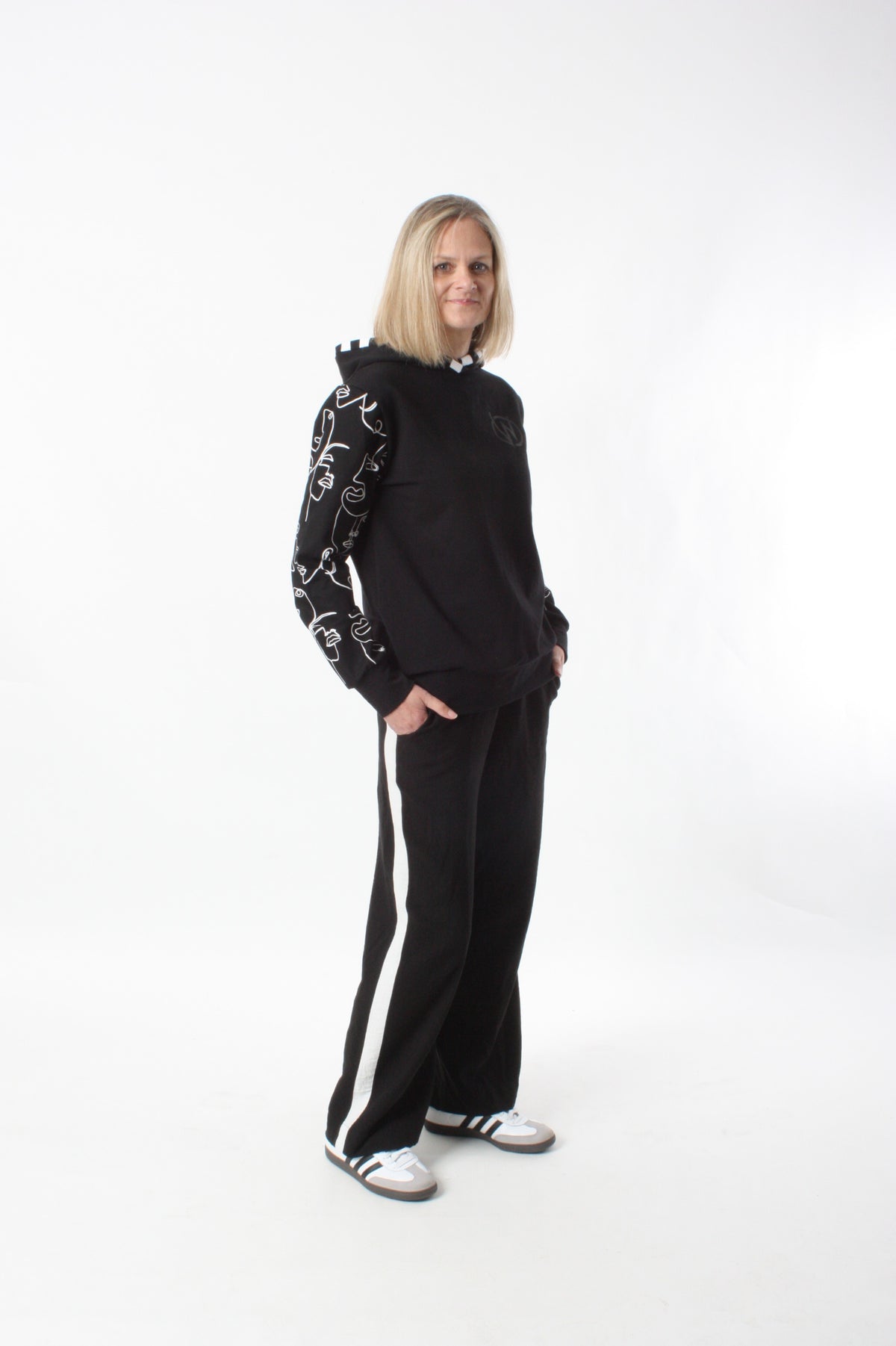 Holly Hoodie - Black with White faces print sleeves