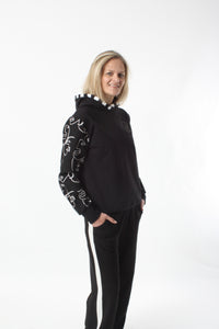 Holly Hoodie - Black with White faces print sleeves
